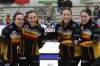 Kelsey Calvert, from left, Beth Peterson, Katherine Remillard and Melissa Gordon-Kurz hoist Manitoba&rsquo;s women&rsquo;s curling championship trophy in Rivers on Sunday. (Thomas Friesen/The Brandon Sun)