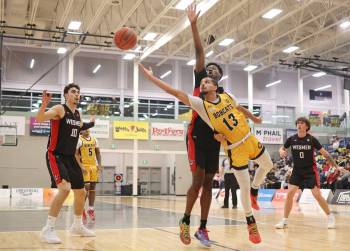 Munroop Gill of the Brandon Bobcats takes an off-balance layup against the Winnipeg Wesmen during Canada West men&rsquo;s basketball action at the HLC on Friday. (Tim Smith/The Brandon Sun)