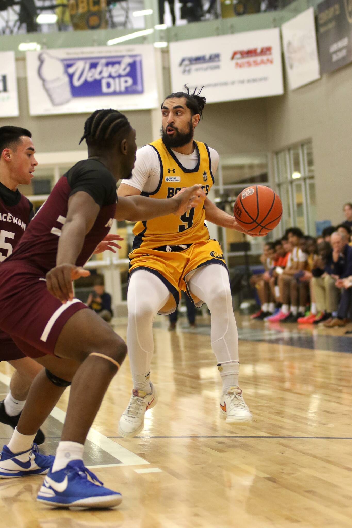 Bhatti leads late charge as BU tops MacEwan