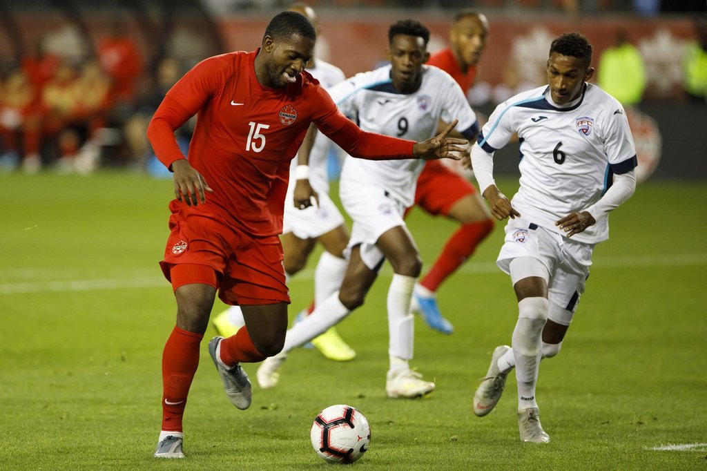 Former Canada defender Doneil Henry learning the other side of football these days