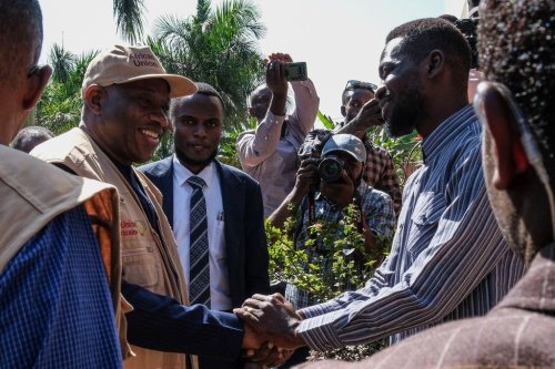 Uganda opposition presidential candidate Robert Kyagulanyi Ssentamu, known as Bobi Wine, right, greets election observers, including former Nigerian President Goodluck Jonathan, at his home in Magere village on the outskirts of Kampala, Uganda, Wednesday, Jan. 14, 2026. (AP Photo/Hajarah Nalwadda)
