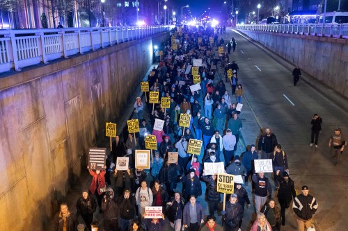 Demonstrators march to the White House in Washington on Jan. 8 as they protest against the Immigration and Customs Enforcement (ICE) agent who fatally shot Renee Nicole Good in Minneapolis. (The Associated Press files))
