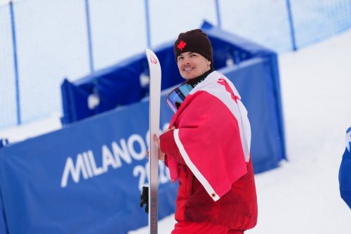 Canada's Mikael Kingsbury leaves the podium after winning the silver medal in the men's moguls final at the Milano Cortina 2026 Winter Olympic Games in Livigno, Italy on Thursday, Feb. 12, 2026. THE CANADIAN PRESS/Sean Kilpatrick