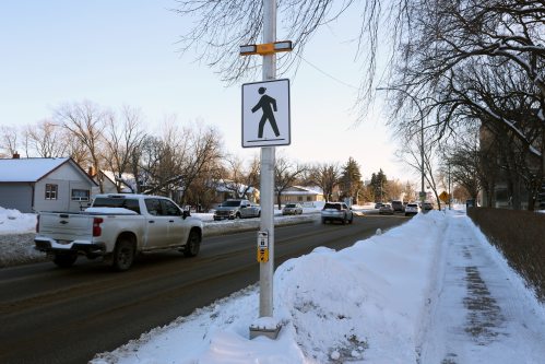 The crosswalk on 18th Street at Lorne Avenue in front of Brandon University. The city recently installed flashing lights as part of the crosswalk. (Tim Smith/The Brandon Sun)