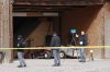 Authorities conduct an investigation at a home where a woman was found dead in Lyman, Utah, Thursday, March 5, 2026. (AP Photo/George Frey)