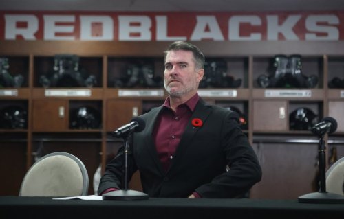 Ryan Dinwiddie arrives at a press conference after being named as the new head coach and general manager of the Ottawa Redblacks CFL team in Ottawa, Thursday, Nov. 6, 2025. THE CANADIAN PRESS/Patrick Doyle