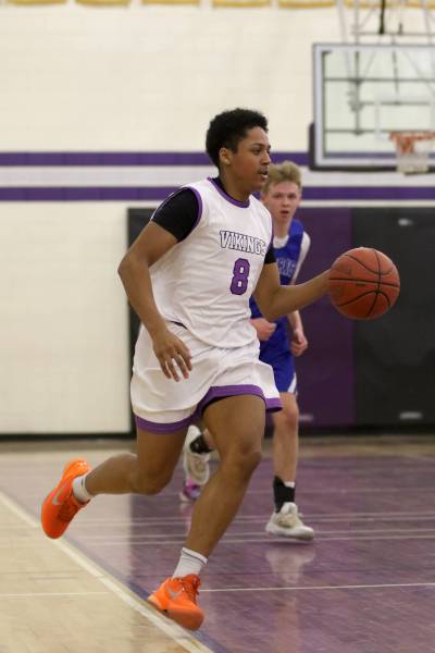 Knox Smith dribbles up the court during the Vincent Massey Vikings varsity boys&rsquo; basketball game against the Souris Sabres on Wednesday. (Thomas Friesen/The Brandon Sun)