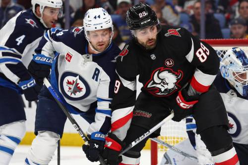 Buffalo Sabres right winger Alex Tuch (right), shown during a March 2024 game in Buffalo, N.Y., is one of the reasons the Sabres may make the playoffs this year. (The Associated Press)