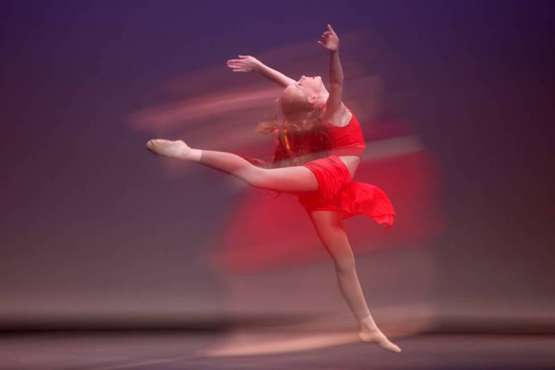 Karrina Taylor performs in the lyrical dance solo, own choice, 12 years and under category, as seen in a double-exposure photograph, during Day 5 of the dance portion of the Brandon Festival of the Arts at the Western Manitoba Centennial Auditorium on Thursday. (Tim Smith/The Brandon Sun)