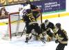 Regina Pats forward Ruslan Karimov (25) appears to score on Brandon Wheat Kings goalie Filip Ruzicka (30) as Nigel Boehm (12), Cameron Allard (6) and Luke Mistelbacher (26) look on during Western Hockey League action at Assiniboine Credit Union Place on Friday. It was quickly ruled to be no goal &mdash; no doubt because the forward beat the puck into the crease &mdash; and didn&rsquo;t go to a video review. (Perry Bergson/The Brandon Sun)