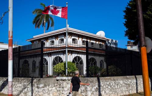A man walks past Canada&rsquo;s embassy in Havana, Cuba, in a 2018 photo. Canada was one of the few U.S. allies to maintain diplomatic relations with Cuba following the 1959 revolution that overthrew the U.S.-backed regime. (The Associated Press files)