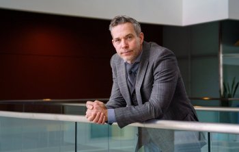 Brian McQuinn, associate professor at the University of Regina and co-lead of CIPHER, stands for a photograph in Regina, on Monday, Feb. 2, 2026. THE CANADIAN PRESS/Heywood Yu