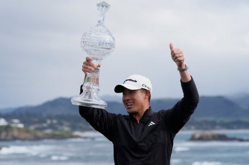 Collin Morikawa celebrates at Pebble Beach Golf Links after winning the AT&T Pebble Beach Pro-Am golf tournament in Pebble Beach, Calif., Sunday, Feb. 15, 2026. (AP Photo/Godofredo A. Vásquez)