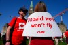 Unionized employees and supporters take part in a rally for Air Canada flight attendants on Parliament Hill in Ottawa, on Tuesday, Sept. 16, 2025. THE CANADIAN PRESS/Sean Kilpatrick