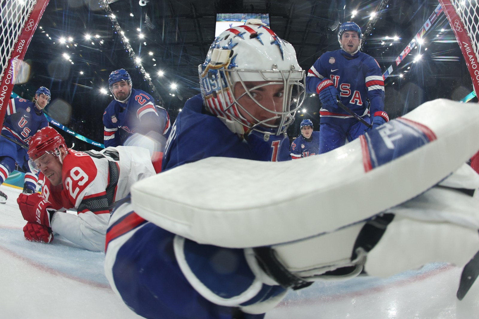 American Jeremy Swayman allows a long-distance goal against Denmark at the Olympics