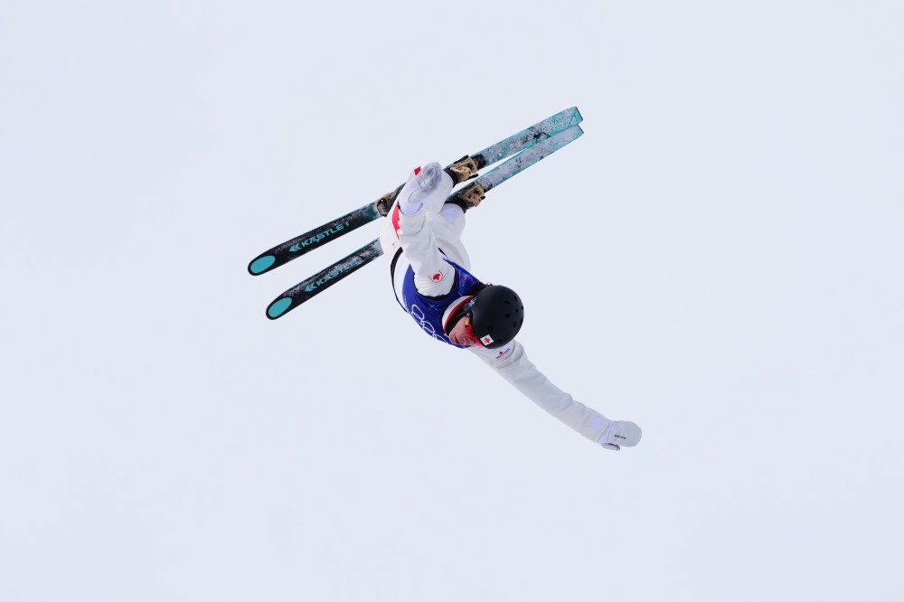 2026年2月18日水曜日、イタリアのリヴィーニョで開催される2026年ミラノ・コルティナ冬季オリンピックの女子フリースタイルスキーエアリアルの2回目のジャンプに出場するカナダのマリオン・テノー選手。カナダのプレス/ショーン・キルパトリック