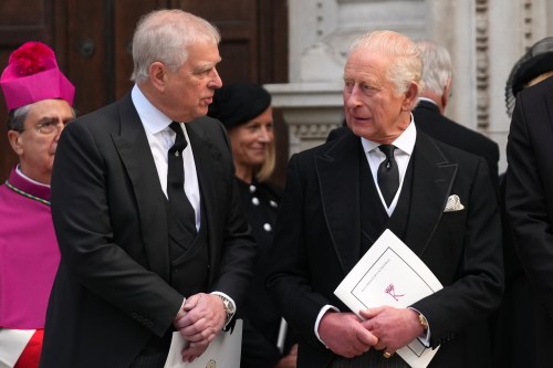 FILE - Then-Britain's Prince Andrew, left, and Britain's King Charles III leave after the Requiem Mass service for the Duchess of Kent at Westminster Cathedral in London, Sept. 16, 2025. (AP Photo/Joanna Chan, File)