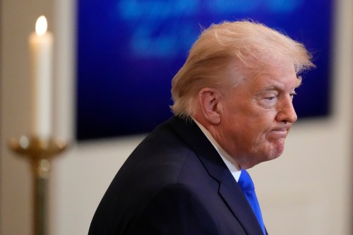 President Donald Trump leaves after an event in the East Room of the White House on Monday, Feb. 23, 2026, in Washington. (AP Photo/Alex Brandon)