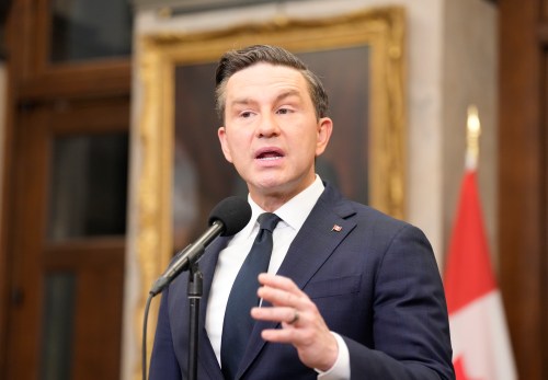 Conservative Leader Pierre Poilievre speaks in the foyer of the House of Commons in Ottawa on Tuesday, Feb. 17, 2026. THE CANADIAN PRESS/Adrian Wyld