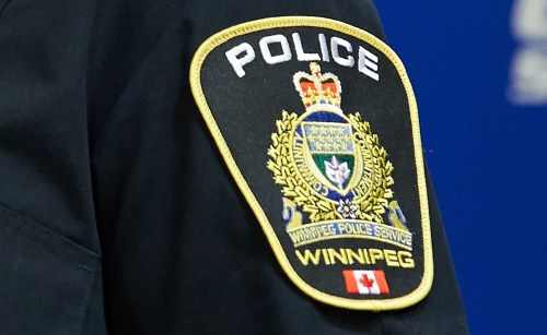 A Winnipeg Police Service shoulder badge is seen on Sept. 2, 2021 at the Public Information Office in Winnipeg. THE CANADIAN PRESS/David Lipnowski