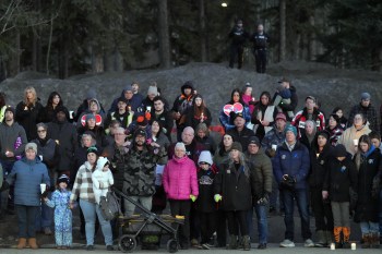 People attend a vigil for the victims of a mass shooting, in Tumbler Ridge, B.C., Friday, Feb. 13, 2026. THE CANADIAN PRESS/Christinne Muschi