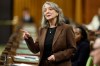 Environment and Climate Change Minister Julie Dabrusin rises during Question Period on Parliament Hill in Ottawa, Friday, Feb. 6, 2026. THE CANADIAN PRESS/Patrick Doyle