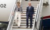 Prime Minister Mark Carney and Diana Fox Carney disembark a government plane as they arrive in Sydney, Australia, Tuesday, March 3, 2026. THE CANADIAN PRESS/Adrian Wyld