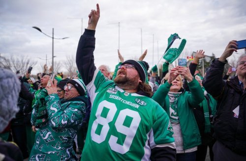 Spectators cheer in front of Mosaic Stadium in Regina, Monday, Nov. 17, 2025. THE CANADIAN PRESS/Heywood Yu