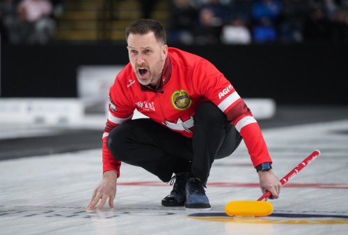 Canada skip Brad Gushue calls out to the sweepers after delivering a rock while playing Alberta-Jacobs during the semifinal at the Brier, in Kelowna, B.C., on Sunday, March 9, 2025. THE CANADIAN PRESS/Darryl Dyck