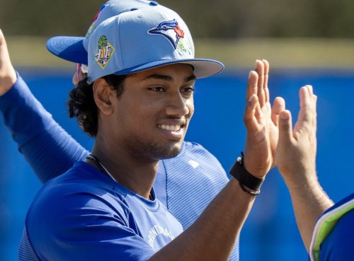 Toronto Blue Jays Arjun Nimmala gets a high five after a session at Spring Training in Dunedin, Fla. on Tuesday February 17, 2026. THE CANADIAN PRESS/Frank Gunn