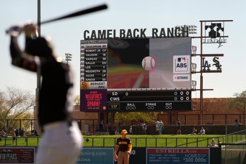 FILE - The Automated Ball/Strike System plays on the scoreboard after a pitch call was challenged during the first inning of a spring training baseball game between the Chicago White Sox and the San Diego Padres, Feb. 26, 2025, in Phoenix. (AP Photo/Carolyn Kaster, File)