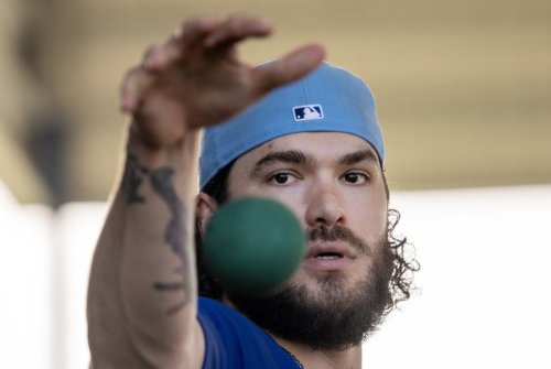 Toronto Blue Jays pitcher Cody Ponce warms up at Spring Training in Dunedin, Fla., on Thursday, Feb. 19, 2026. THE CANADIAN PRESS/Frank Gunn