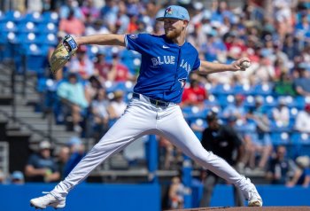 Toronto Blue Jays starting pitcher Eric Lauer pitches in 1st inning spring training action against the Philadelphia Phillies in Dunedin, Fla. on Saturday Feb. 21, 2026. THE CANADIAN PRESS/Frank Gunn