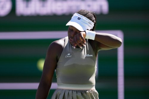 Victoria Mboko, of Canada, reacts after losing a point against Aryna Sabalenka, of Belarus, during a quarterfinal match at the BNP Paribas Open tennis tournament, Thursday, March 12, 2026, in Indian Wells, Calif. (AP Photo/Mark J. Terrill)