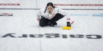 Team Canada skip Kerri Einarson directs her teammates as she plays Turkey at the World Women’s Curling Championship in Calgary on March 18, 2026. THE CANADIAN PRESS/Jeff McIntosh