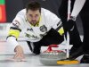 Matt Dunstone, skip of Team Manitoba-Dunstone releases his stone during the 1 vs. 2 playoffs at the Montana's Brier Canadian men's curling championship, in St. John's, N.L., on Saturday, March 7, 2026. THE CANADIAN PRESS/Paul Daly