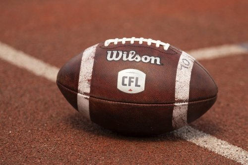Canadian Football League logo seen on a football during CFL training camp at Alumni Stadium in Guelph, Ont., Sunday, May 12, 2024. THE CANADIAN PRESS/Nick Iwanyshyn