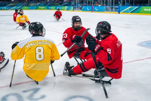 Liam Hickey, Tyler McGregor celebrate the goal against China in the Para ice hockey semifinal at the 2026 Paralympic Games in Milan, Italy on March 13, 2026. .THE CANADIAN PRESS/Handout – CANADIAN PARALYMPIC COMMITTEE, , Matteo Cogliati