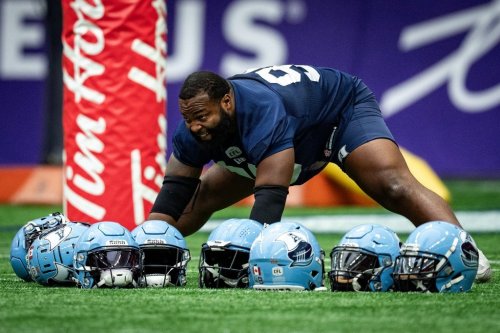 Toronto Argonauts' Ralph Holley stretches during football practice ahead of the 111th CFL Grey Cup, in Vancouver, on Thursday, November 14, 2024. THE CANADIAN PRESS/Ethan Cairns