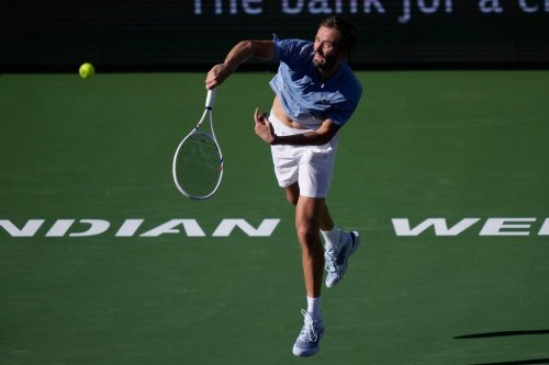Daniil Medvedev, of Russia, serves against Carlos Alcaraz, of Spain, during a semifinal match at the BNP Paribas Open tennis tournament, Saturday, March 14, 2026, in Indian Wells, Calif. (AP Photo/Mark J. Terrill)