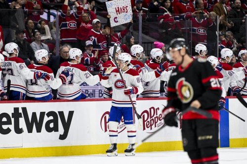 Montreal Canadiens' Alexandre Texier (85) celebrates his goal on Ottawa Senators' goaltender Linus Ullmark (35), not pictured, with teammates during second period NHL hockey action in Ottawa, on Wednesday, March 11, 2026. THE CANADIAN PRESS/Spencer Colby
