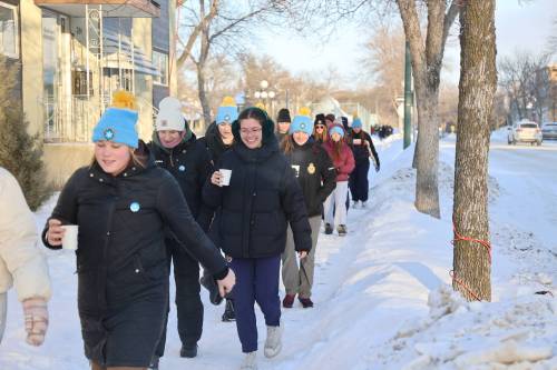 Brandon residents walk along Lorne Ave during the annual Coldest Night of the Year walk on Saturday evening. The walk began at Knox United Church, a longtime supporter of the event, and followed a route along Victoria Avenue, turning onto 13th Street and Lorne Ave. before looping back along 17th Street to the church.