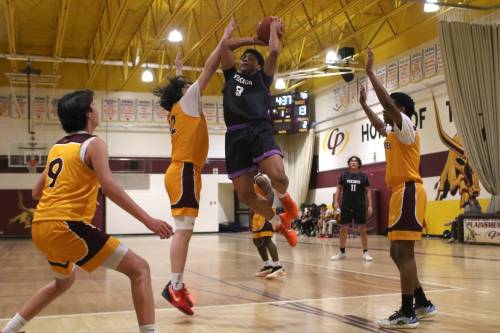 Vincent Massey Vikings Knox Smith gets fouled on a jump shot against the Crocus Plainsmen in Game 2 of the varsity boys city final at Crocus on Monday. (Thomas Friesen/The Brandon Sun)