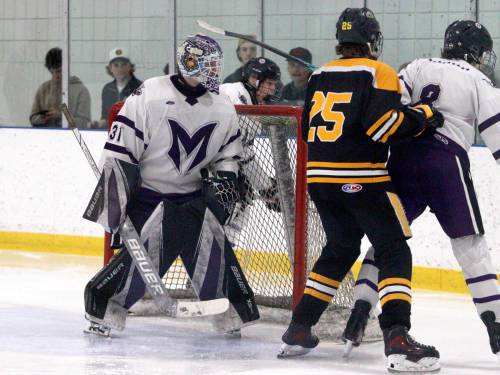 Vikings starting netminder Hunter Gregory (31) searches for a loose puck behind his net in the dying minutes of the third period. Gregory made 37 saves in the win. (Massimo De Luca-Taronno/The Brandon Sun)