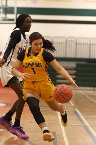 Crocus Plainsmen Genesis Lopez Mejia drives against the Daniel Mac Maroons during the first round of AAAA varsity girls basketball provincials in Winnipeg on Thursday. (Thomas Friesen/The Brandon Sun)