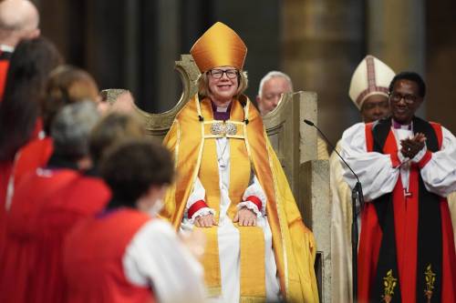 Sarah Mullally sits during the enthronement ceremony installing her as the 106th Archbishop of Canterbury at Canterbury Cathedral, England, on Wednesday. (The Associated Press)