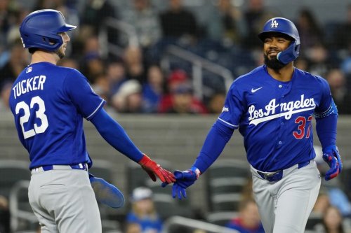 Los Angeles Dodgers slugger Teoscar Hernández (37) celebrates with teammate Kyle Tucker (23) after scoring on a two-run homer in a Major League Baseball game against the Blue Jays in Toronto on April 6, 2026. THE CANADIAN PRESS/Frank Gunn