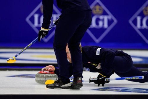Sweden's Niklas Edin delivers the rock during a gold medal match against Canada at the curling world championships, Saturday, April 4, 2026, in Ogden, Utah. (AP Photo/Tyler Tate)