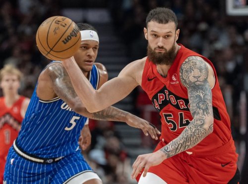 Toronto Raptors centre Sandro Mamukelashvili (54) steals the ball from Orlando Magic forward Paolo Banchero (5) during first half NBA action in Toronto on Sunday, March 29, 2026. THE CANADIAN PRESS/Frank Gunn