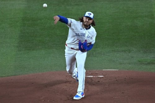 Toronto Blue Jays pitcher Cody Ponce (66) throws to a Colorado Rockies batter in first inning interleague MLB baseball action in Toronto on Monday, March 30, 2026. THE CANADIAN PRESS/Jon Blacker